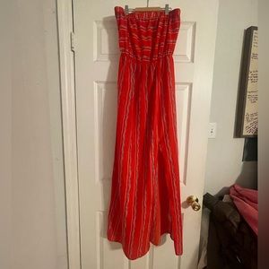 Strapless orange dress with black and white stripes